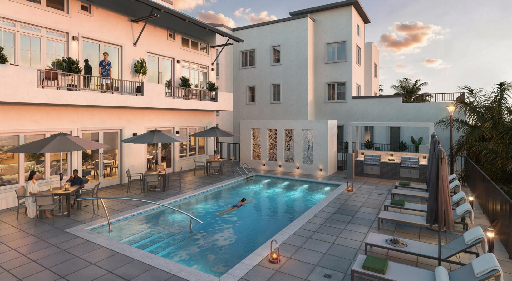 a pool with a building in the background