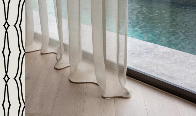 a white railing over a body of water